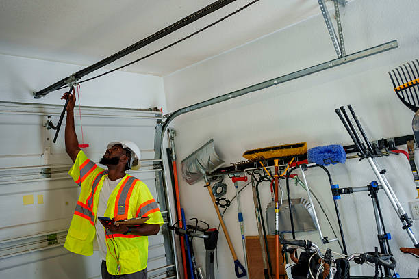 Professional Garage Door Panel Replacement technician working in Pine Island, MN